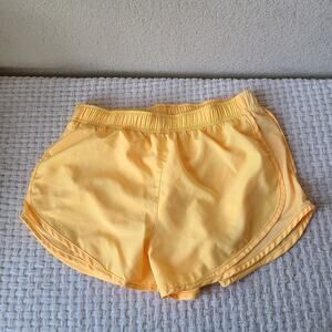 Nike Women's Athletic Shorts in Bright Neon Yellow Orange Size M